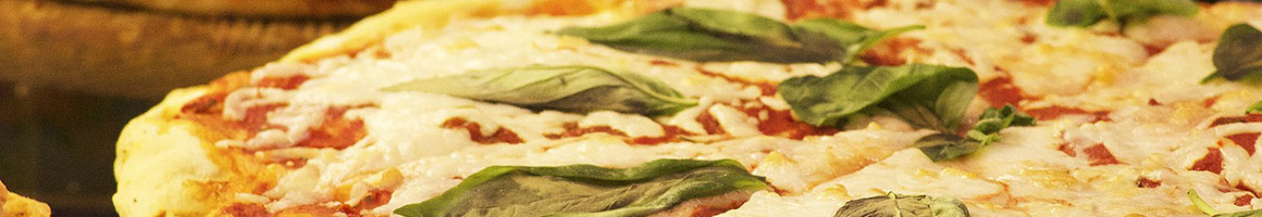 Eating Italian Pizza at Spinato's Pizzeria and Family Kitchen restaurant in Scottsdale, AZ.